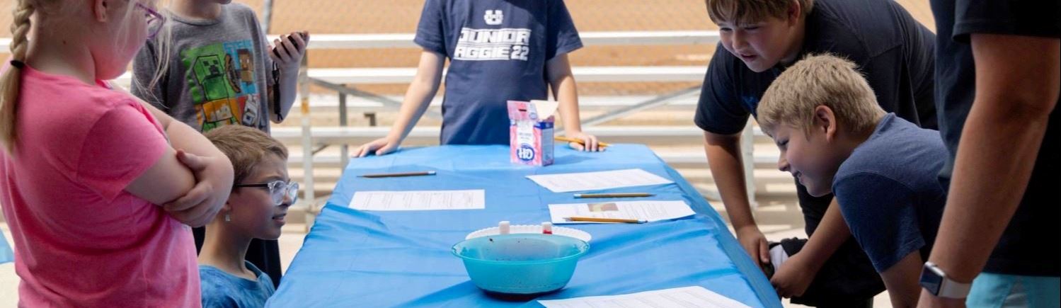 Children conducting a science experiment