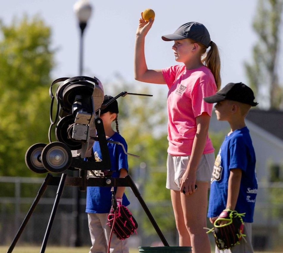 A person holding a baseball